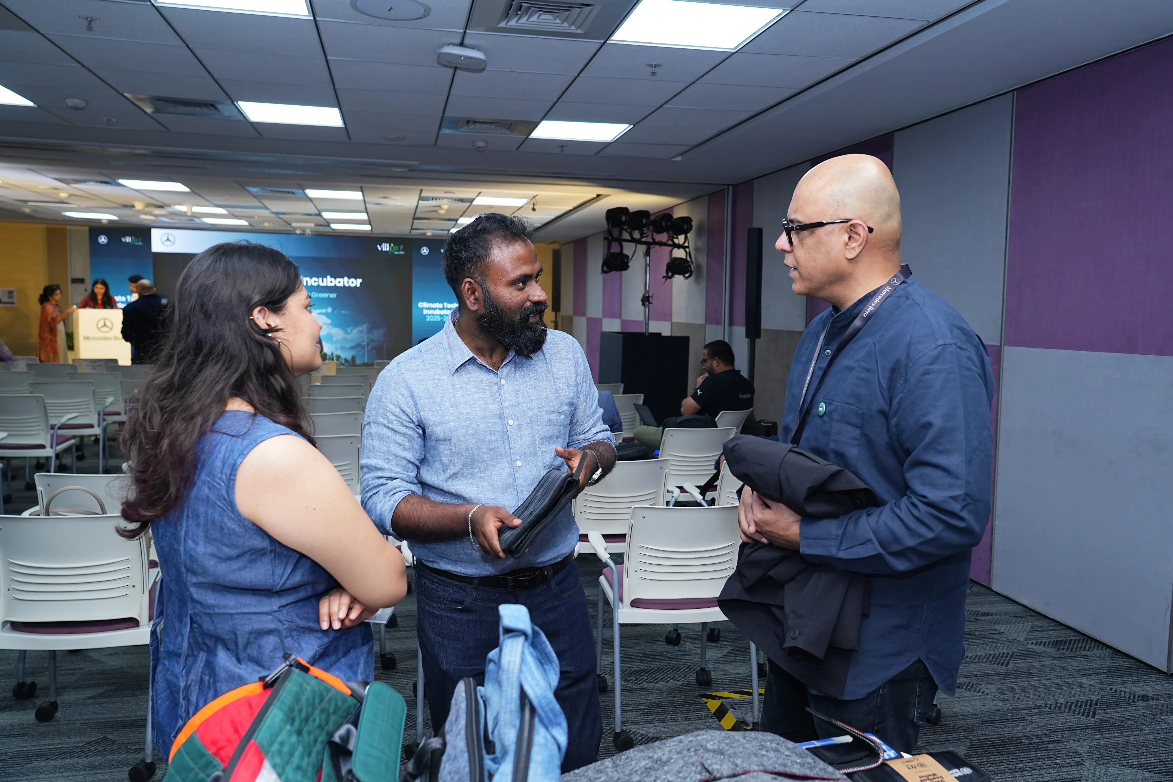Attendees in conversation at Demo Day