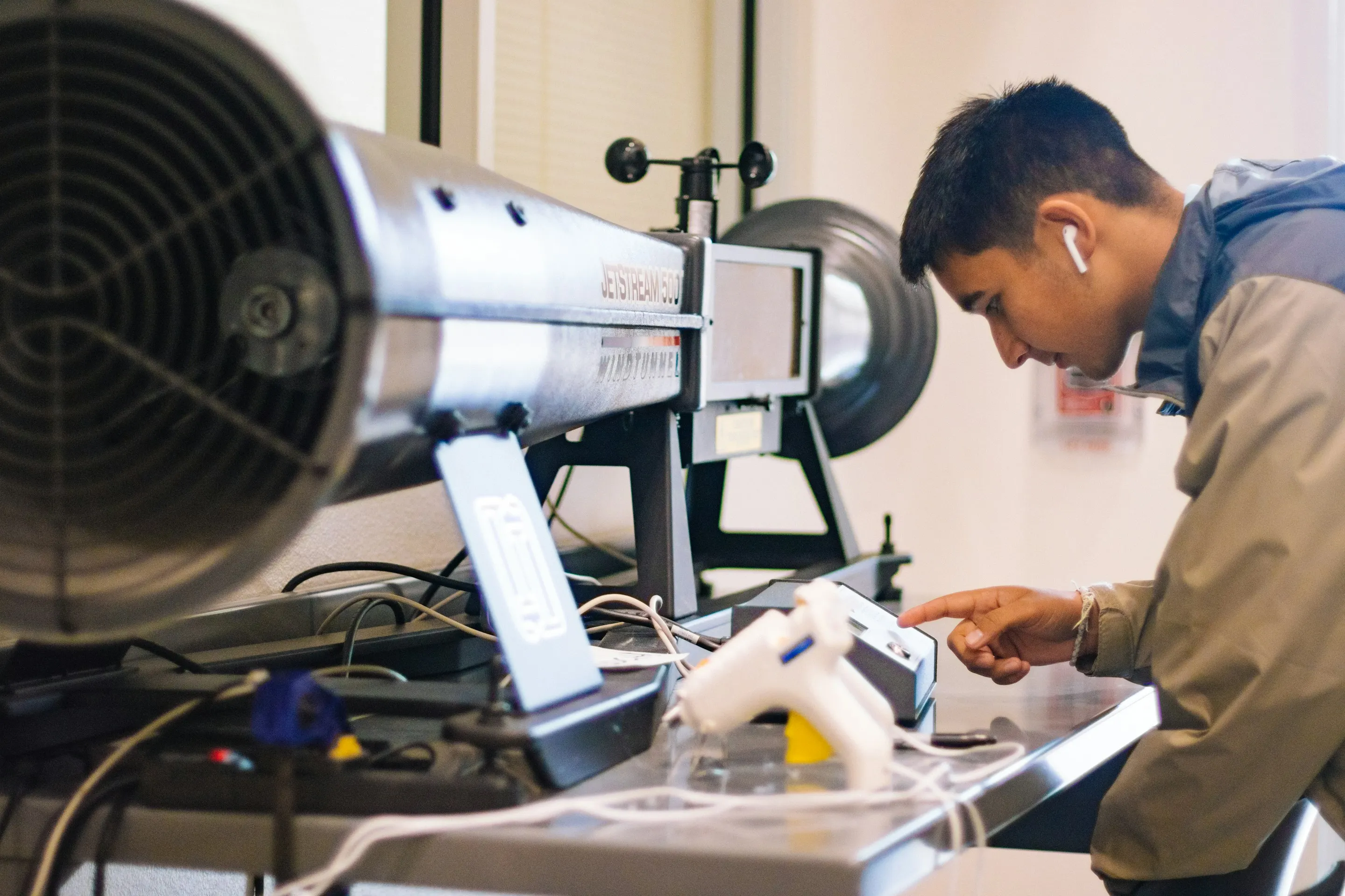 A researcher testing equipment in a lab